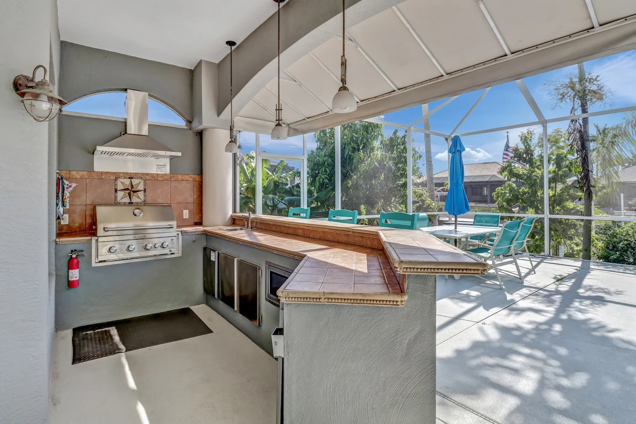 An outdoor kitchen available at one of our stunning properties.